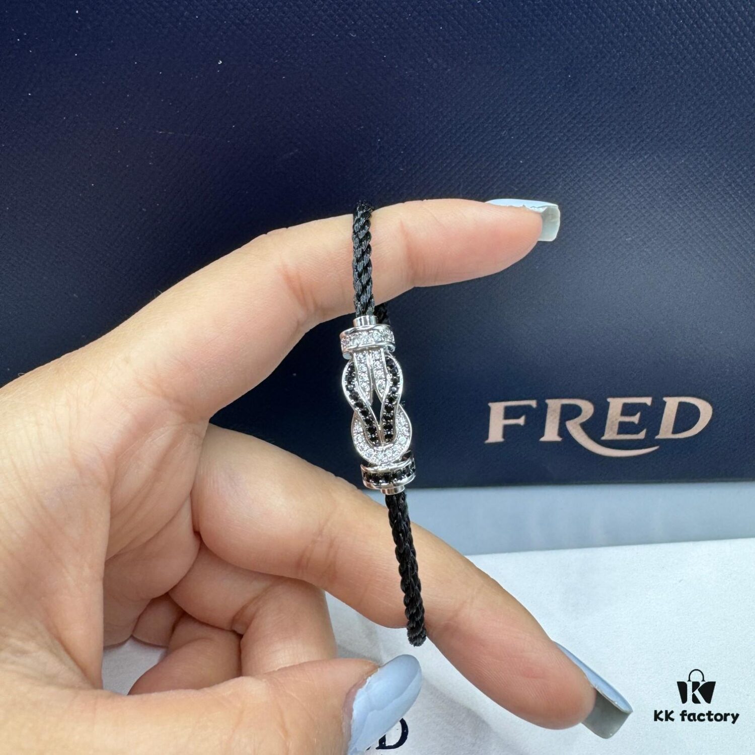 692ff6bc99f2d84055c8dfda FRED Force 10 Bracelet in Platinum Medium Size with Panda Motif, Black and White Design, Steel Clasp and Black Cord