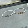 692ff71a99f2d84055c8e03e New Arrival❤️ Fred-inspired Small Half-diamond Infinity Knot White Rope Bracelet👉🏻 Luxury Fashion Exquisite 💠⭐️ High-end Customized – Thickened 18K Gold Plated Craft, Precision Micro-inlay, Must-have for Influencers and Trendsetters