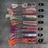 692ff75899f2d84055c8e0a6 Dior Knitted Adjustable Tassel Bracelet – Authentic Embroidered Design, Not Printed, Matching Original Retail Version
