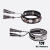 692ff75b99f2d84055c8e0af Dior Knitted Adjustable Tassel Bracelet – Authentic Embroidered Design, Not Printed, Matching Original Retail Version
