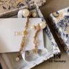 692ff7d599f2d84055c8e1af Dior Vintage Distressed Asymmetric Earrings