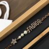 692ff7fb99f2d84055c8e1e3 Jadior Letter Bracelet with Full Diamond Design, Pearl and Metal Accents, Adjustable Length for All Wrist Sizes