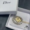 692ff86a99f2d84055c8e28d Dior Oval-Shaped Hair Clip with Sparkling Zircon-Circled Frame and Hollowed Letter Design