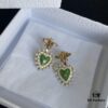 692ff88999f2d84055c8e2bf Dior Bee Pearl Stud Earrings with Hanging Star Design