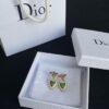 692ff88a99f2d84055c8e2c2 Dior Bee Pearl Stud Earrings with Hanging Star Design
