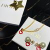 692ff89099f2d84055c8e2cb Dior CD Valentine's Day Limited Edition Openwork Heart Necklace and Stud Earrings with Tomato Red Enamel