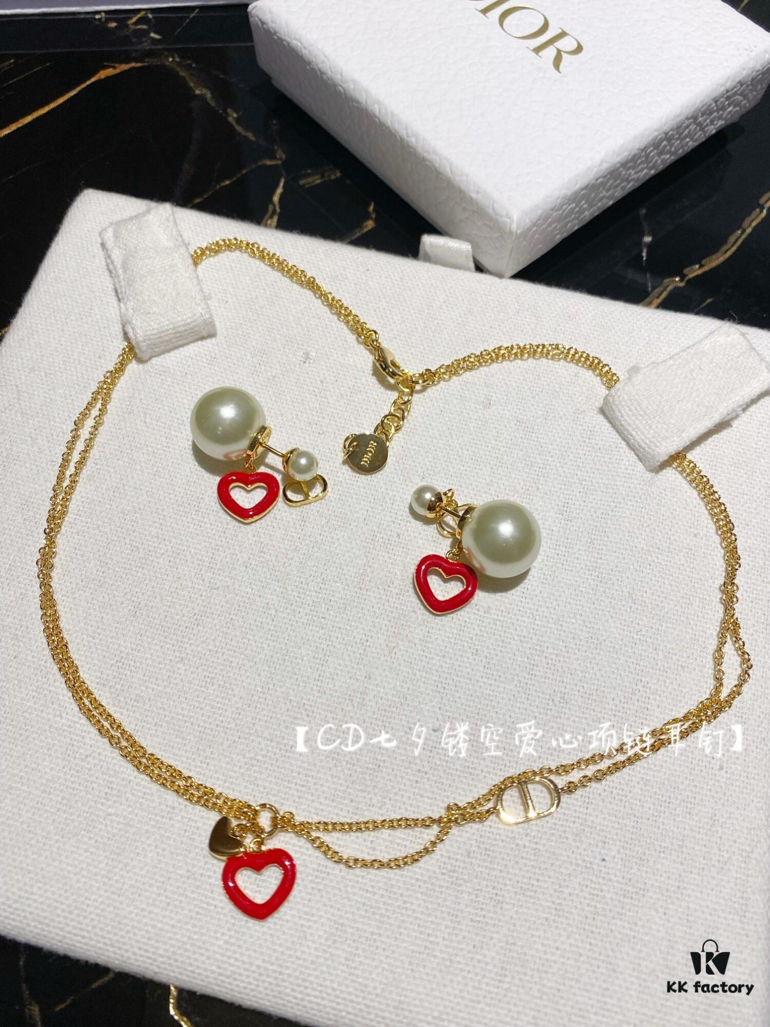 692ff89199f2d84055c8e2cc Dior CD Valentine's Day Limited Edition Openwork Heart Necklace and Stud Earrings with Tomato Red Enamel