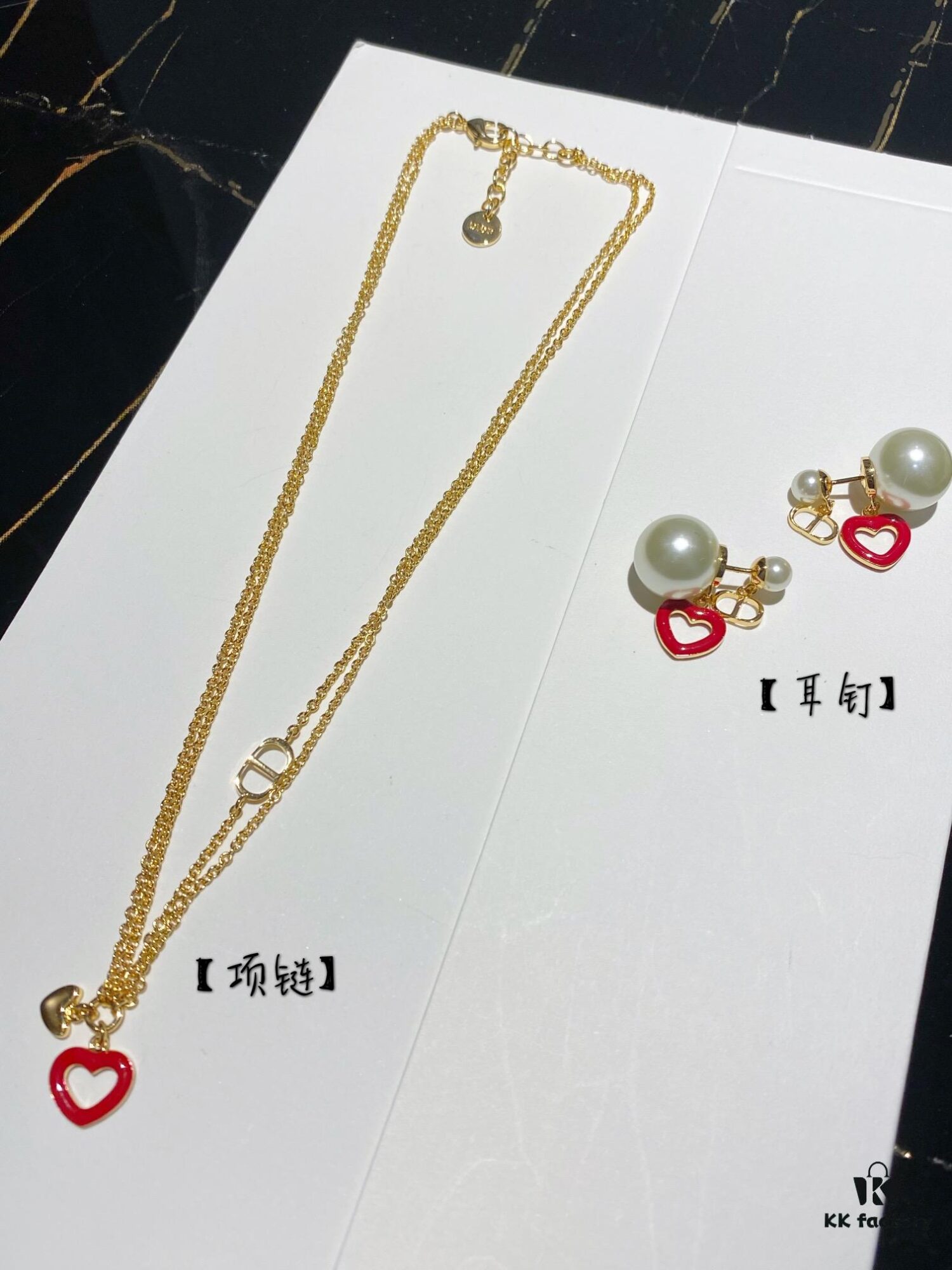 692ff89399f2d84055c8e2d0 Dior CD Valentine's Day Limited Edition Openwork Heart Necklace and Stud Earrings with Tomato Red Enamel