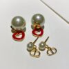 692ff89399f2d84055c8e2d2 Dior CD Valentine's Day Limited Edition Openwork Heart Necklace and Stud Earrings with Tomato Red Enamel