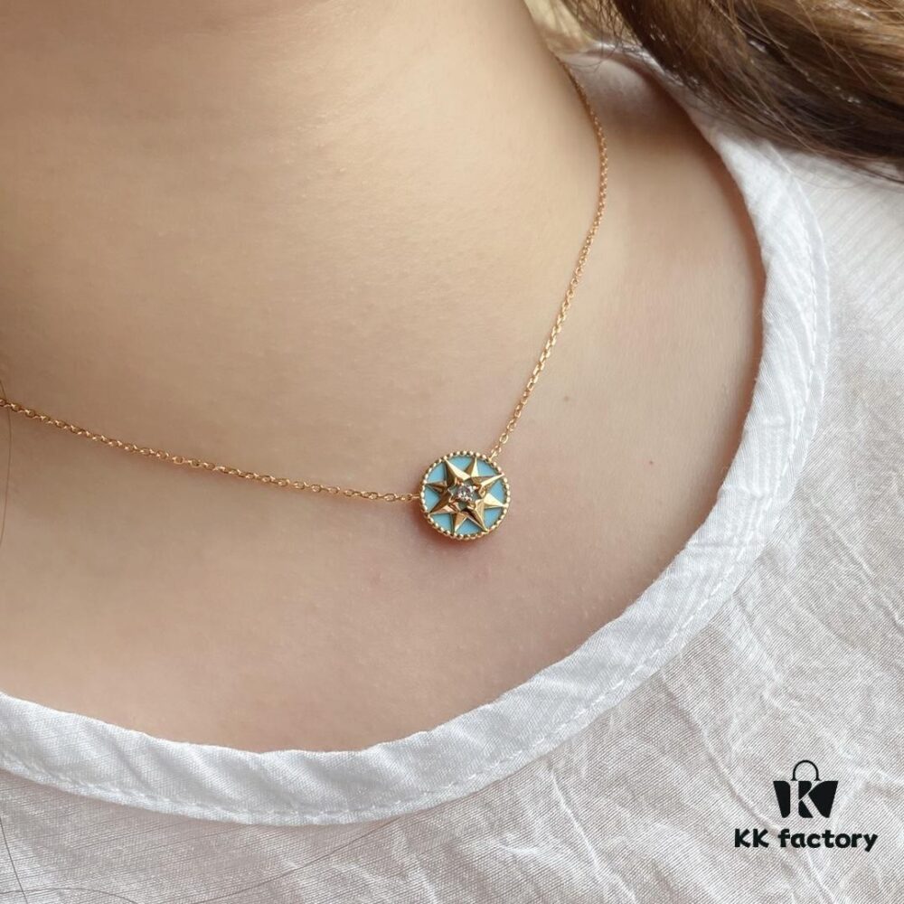 692ff8ca99f2d84055c8e327 Dior Compass Necklace 😊 Victoire de Castellane Reinterprets Mr. Dior's Lucky Star – the Eight-pointed Star – with a Wind Rose Design, Adorned with Intertwined Wheat Sheaves That Swing Playfully on the Chain, Alternating Between a Hardstone Face and a Wind Rose Face