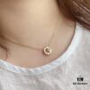 692ff8cd99f2d84055c8e32d Dior Compass Necklace 😊 Victoire de Castellane Reinterprets Mr. Dior's Lucky Star – the Eight-pointed Star – with a Wind Rose Design, Adorned with Intertwined Wheat Sheaves That Swing Playfully on the Chain, Alternating Between a Hardstone Face and a Wind Rose Face