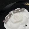 692ff8e599f2d84055c8e359 Dior Diamond-Studded Fashion Set with DIOR Lettering