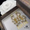 692ff93199f2d84055c8e3da Dior New Style Letter Pearl Inlaid Diamond Elegant Retro Stud Earrings