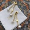 692ff9bb99f2d84055c8e478 Dior Pearl CD Pearl Tassel Stud Earrings