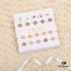 692ffbc799f2d84055c8e6e6 Dior Eight-Pointed Star Compass Braided Bracelet