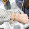 692ffbc899f2d84055c8e6e9 Dior Eight-Pointed Star Compass Braided Bracelet