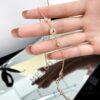 692ffbcf99f2d84055c8e6f0 New Compass Bracelet with Dual Diamonds and Reversible Design – Lucky Octagram Style in Ruby Rose Gold and Yellow Gold White Mother-of-Pearl