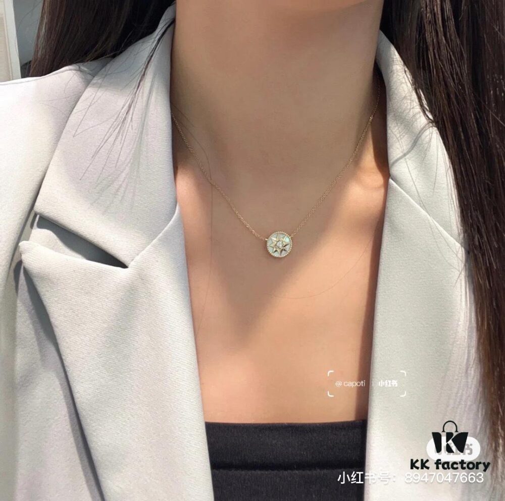 692ffc0d99f2d84055c8e740 Dior Eight-Pointed Star Compass Mother-of-Pearl Necklace Wearing Image