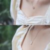 Dior Eight-Pointed Star Compass Mother-of-Pearl Necklace Wearing Image