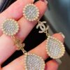 692ffc5f99f2d84055c8e7a0 Xiaoxiang New Sunflower Earrings, Luxury Full Diamond Pearl Drop Design, Elegant and Stylish for Daily Wear