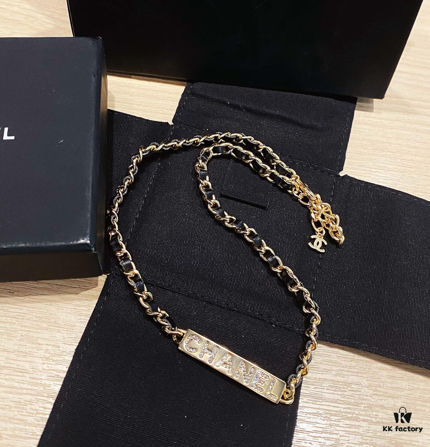 692ffc6f99f2d84055c8e7ab Xiaoxiang New Arrival Leather-Weave Necklace, Handwoven Black Leather with Classic Letter Pendant, Heavy Brass Craft Design
