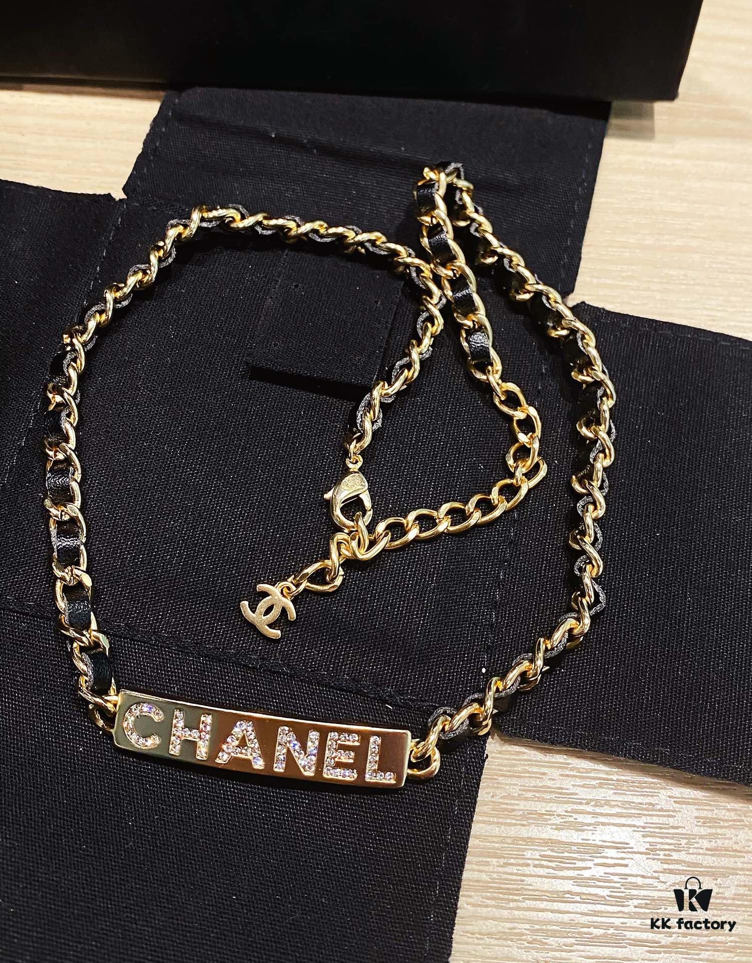 692ffc7299f2d84055c8e7ad Xiaoxiang New Arrival Leather-Weave Necklace, Handwoven Black Leather with Classic Letter Pendant, Heavy Brass Craft Design