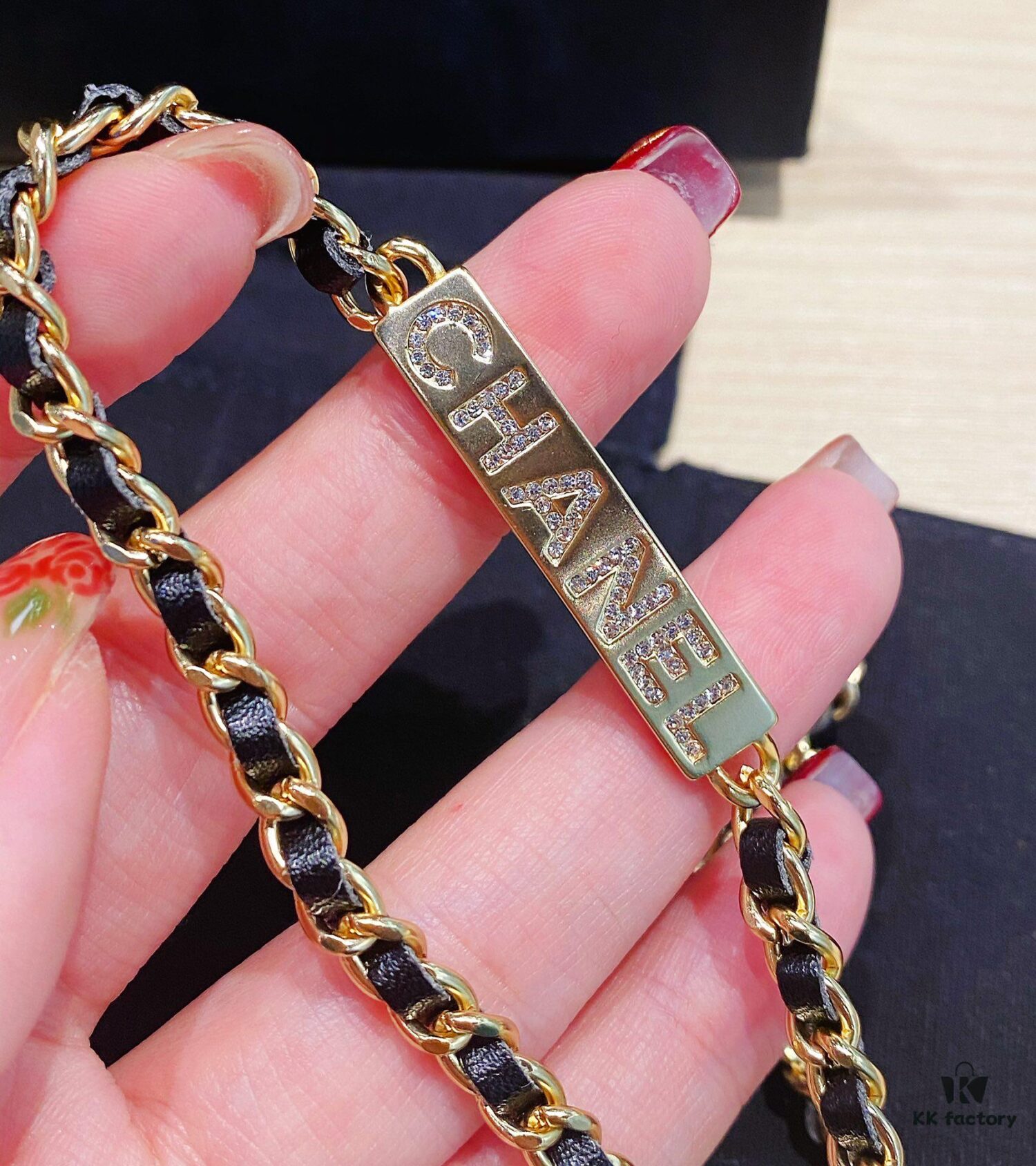 692ffc7699f2d84055c8e7b0 Xiaoxiang New Arrival Leather-Weave Necklace, Handwoven Black Leather with Classic Letter Pendant, Heavy Brass Craft Design