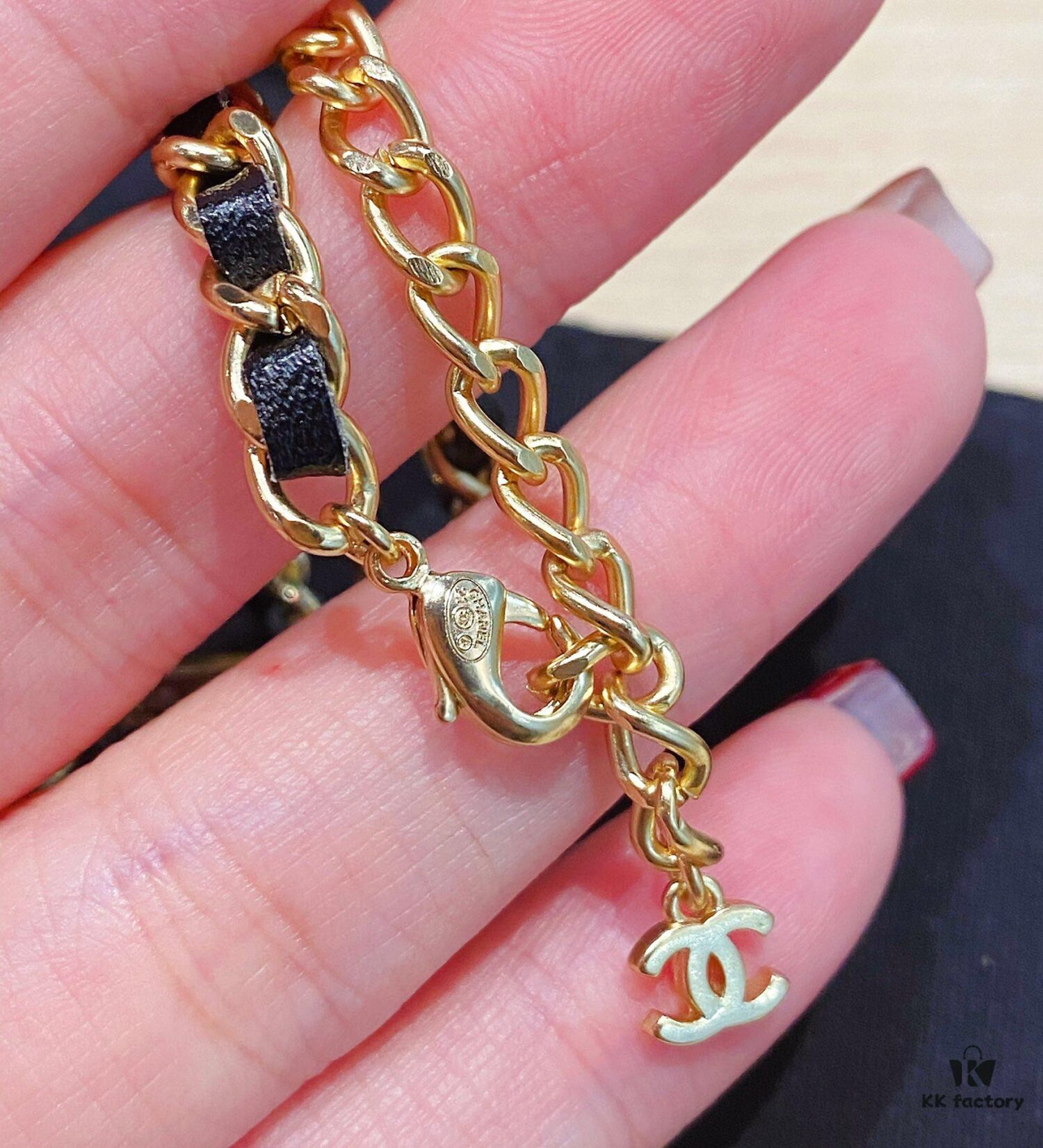 692ffc7799f2d84055c8e7b1 Xiaoxiang New Arrival Leather-Weave Necklace, Handwoven Black Leather with Classic Letter Pendant, Heavy Brass Craft Design