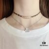 692ffc7999f2d84055c8e7b2 Xiaoxiang New Arrival Leather-Weave Necklace, Handwoven Black Leather with Classic Letter Pendant, Heavy Brass Craft Design