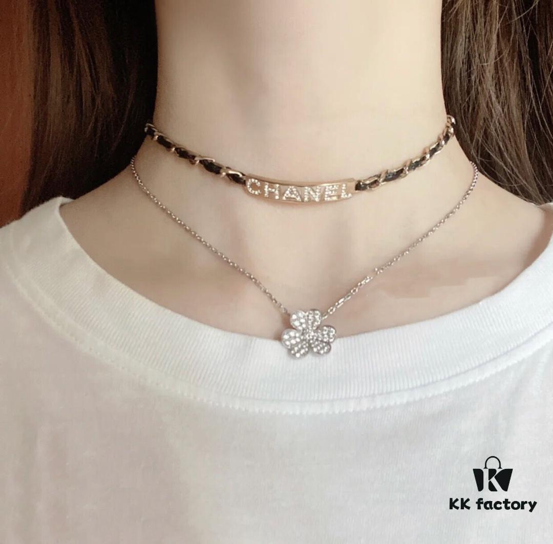 692ffc7999f2d84055c8e7b2 Xiaoxiang New Arrival Leather-Weave Necklace, Handwoven Black Leather with Classic Letter Pendant, Heavy Brass Craft Design