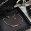 692ffc7b99f2d84055c8e7b3 Xiaoxiang New Arrival Leather-Weave Necklace, Handwoven Black Leather with Classic Letter Pendant, Heavy Brass Craft Design