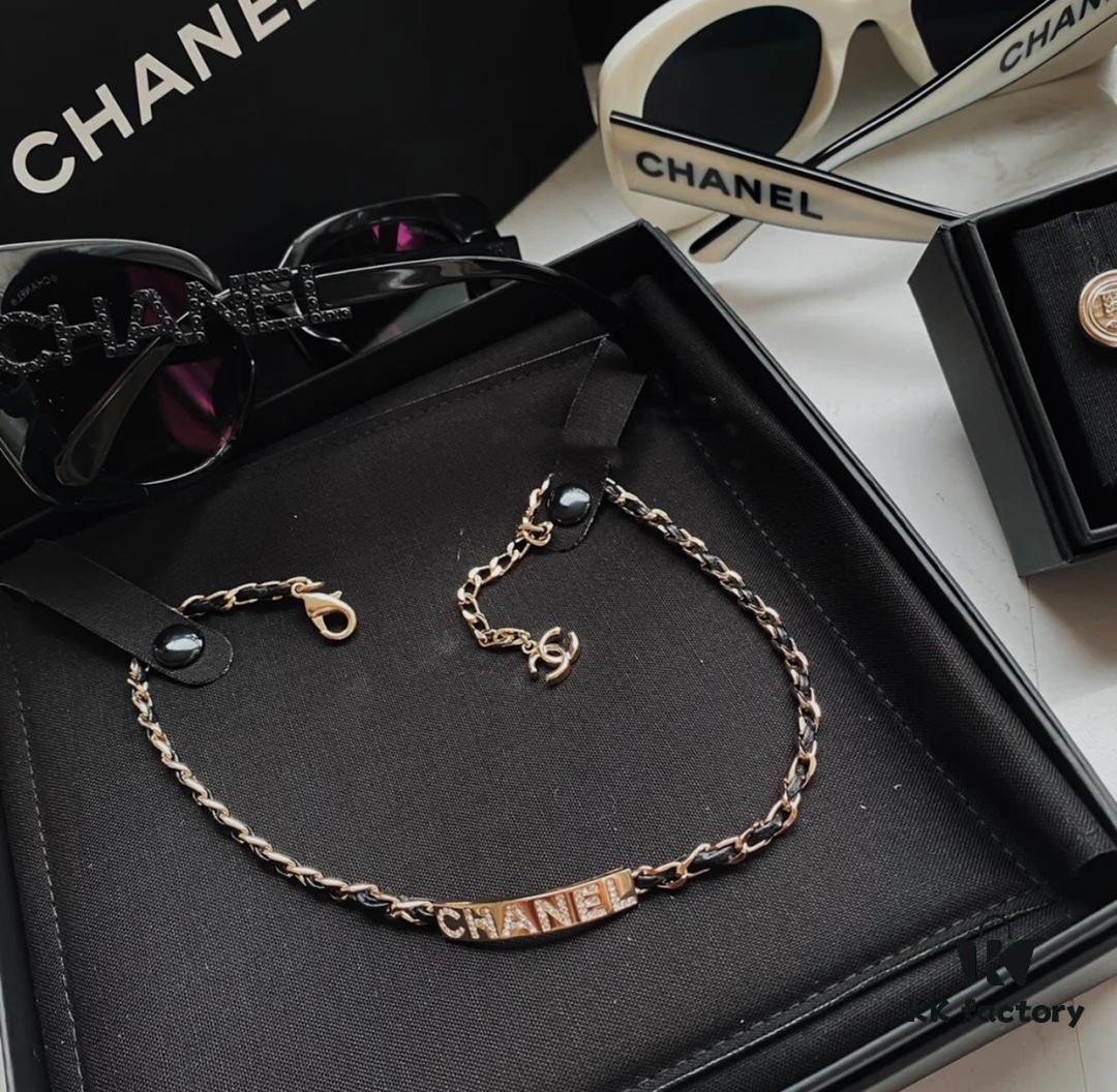 692ffc7b99f2d84055c8e7b3 Xiaoxiang New Arrival Leather-Weave Necklace, Handwoven Black Leather with Classic Letter Pendant, Heavy Brass Craft Design