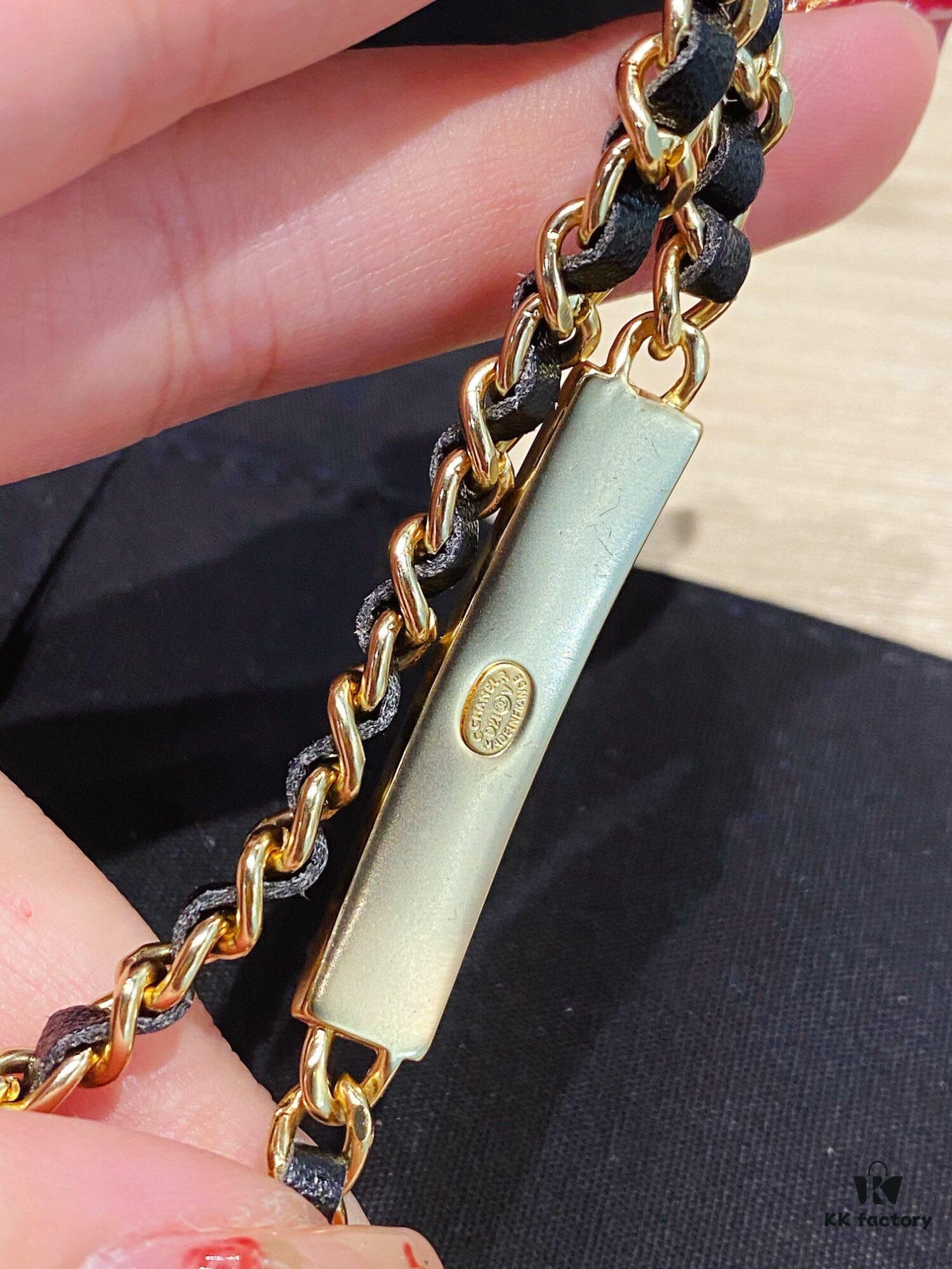 692ffc8099f2d84055c8e7b7 Xiaoxiang New Arrival Leather-Weave Necklace, Handwoven Black Leather with Classic Letter Pendant, Heavy Brass Craft Design