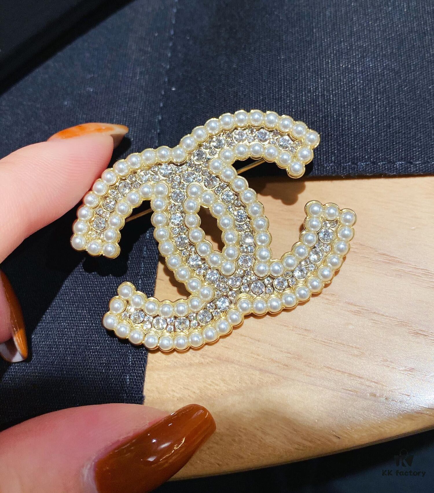 692ffc8699f2d84055c8e7bc Xiaoxiang New Pearl Brooch, Small Pearl Trim Design with Full Rhinestone Double C Shape