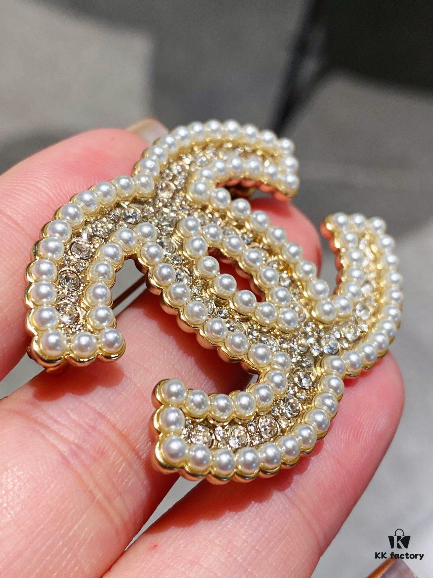 692ffc8799f2d84055c8e7bf Xiaoxiang New Pearl Brooch, Small Pearl Trim Design with Full Rhinestone Double C Shape