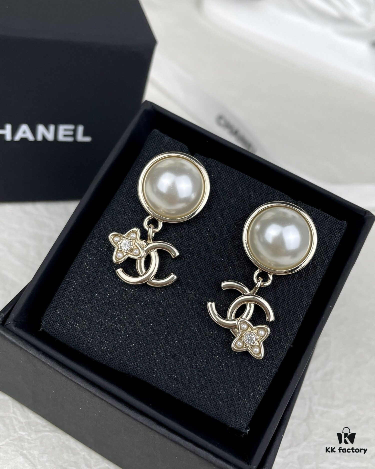 692ffc9599f2d84055c8e7cf Chanel New Arrival Pearl and Floral Earrings
