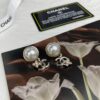 692ffc9b99f2d84055c8e7d4 Chanel New Arrival Pearl and Floral Earrings