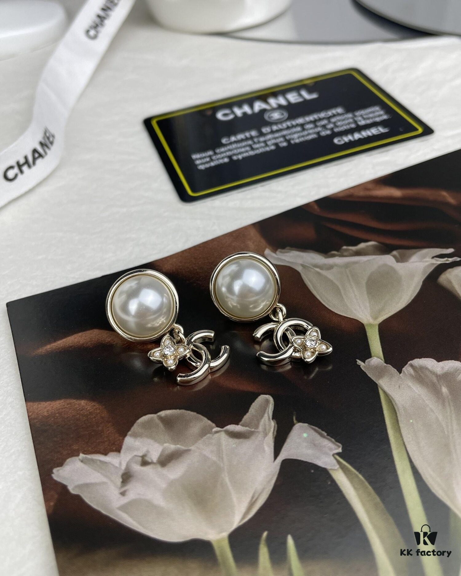 692ffc9b99f2d84055c8e7d4 Chanel New Arrival Pearl and Floral Earrings