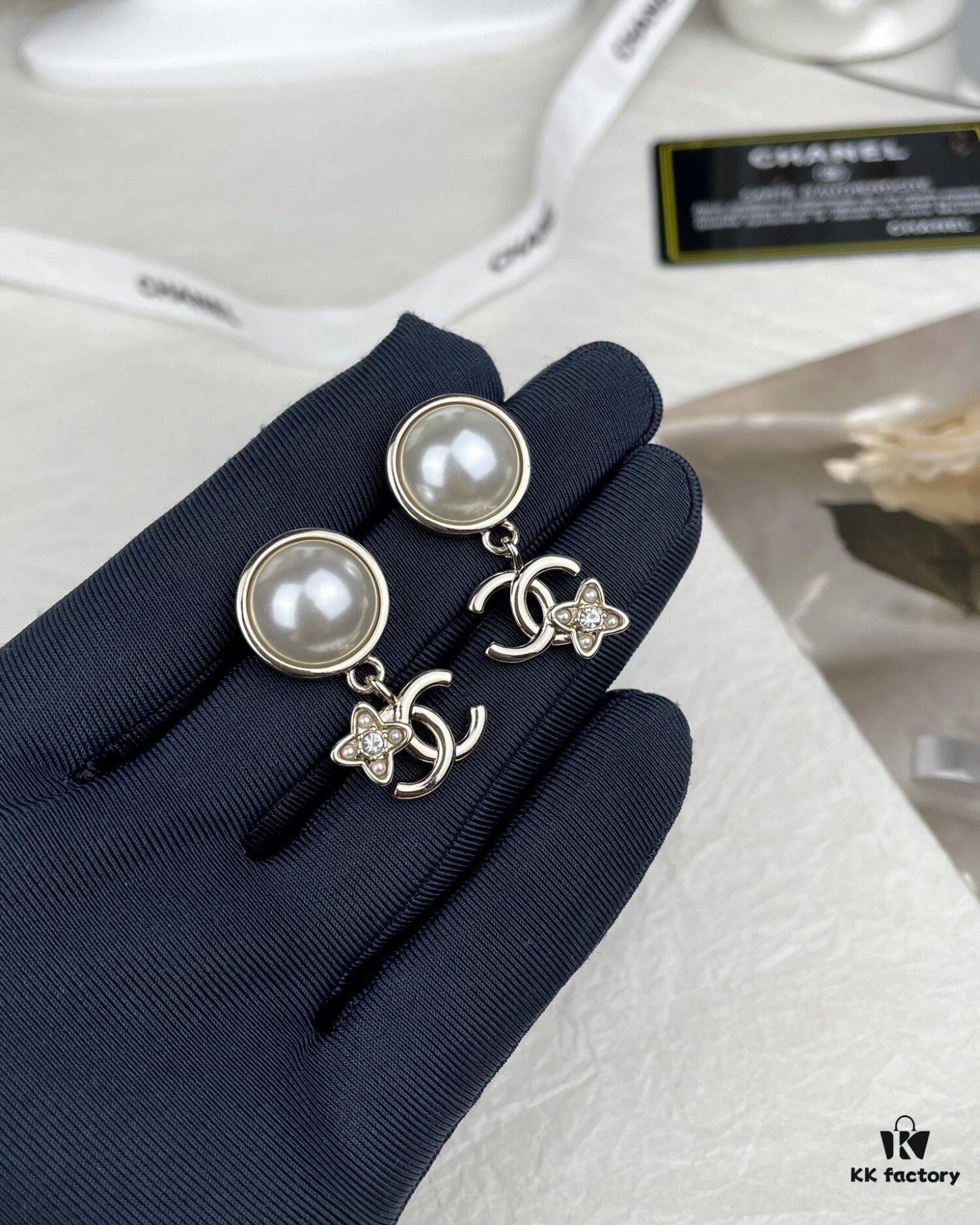 692ffc9c99f2d84055c8e7d5 Chanel New Arrival Pearl and Floral Earrings
