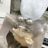 692ffc9c99f2d84055c8e7d6 Chanel New Arrival Pearl and Floral Earrings