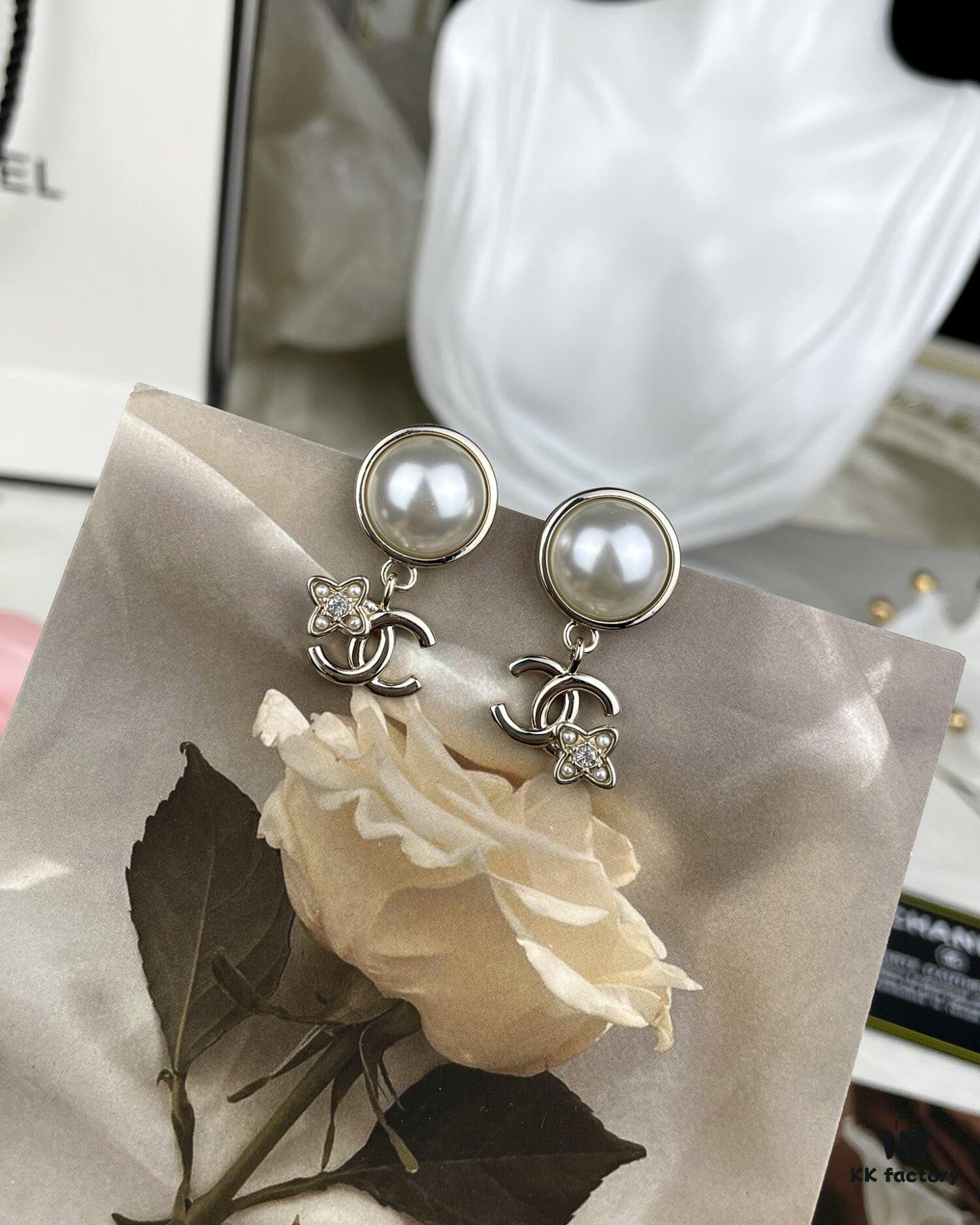 692ffc9c99f2d84055c8e7d6 Chanel New Arrival Pearl and Floral Earrings