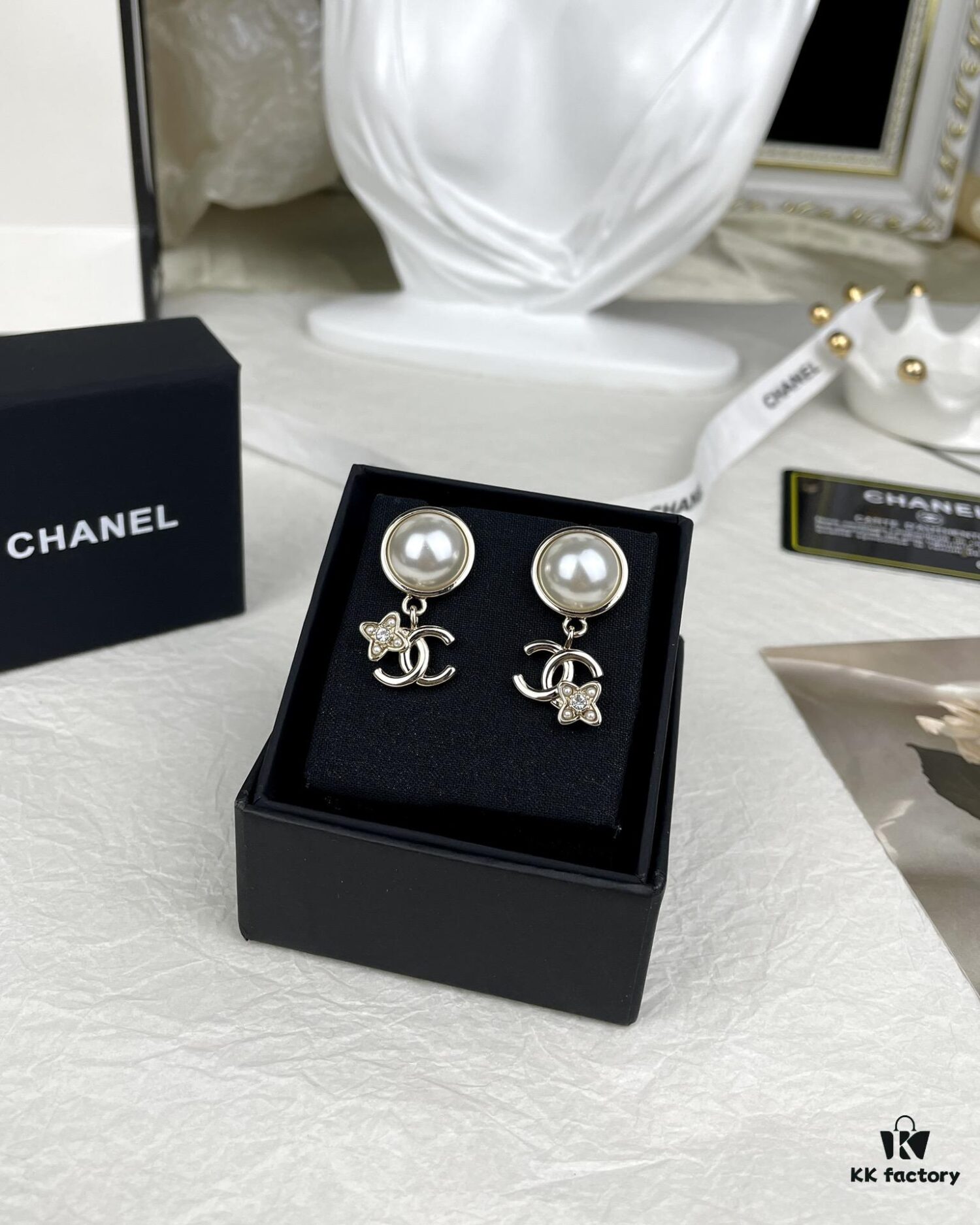 692ffc9c99f2d84055c8e7d7 Chanel New Arrival Pearl and Floral Earrings