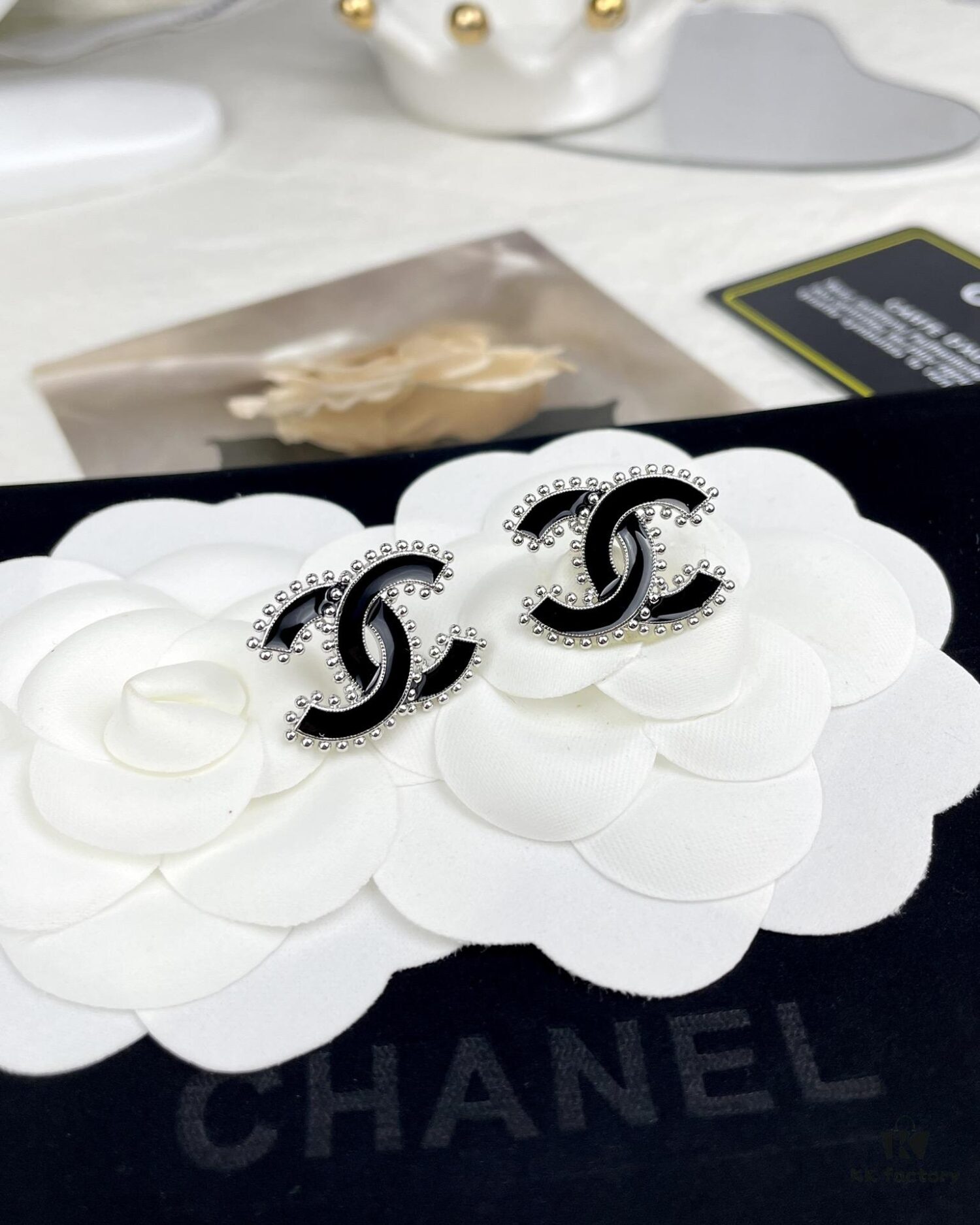 692ffcbb99f2d84055c8e801 CHANE New 2023B Black Enamel Double C Drip Earrings