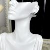 692ffcbd99f2d84055c8e803 CHANE New 2023B Black Enamel Double C Drip Earrings