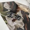 692ffcbe99f2d84055c8e805 CHANE New 2023B Black Enamel Double C Drip Earrings