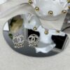 Chanel New Arrival Round CC Openwork Stud Earrings