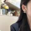 692ffccb99f2d84055c8e818 Xiao Xiang New Twist Braided Double C Pearl Pink Diamond Stud Earrings