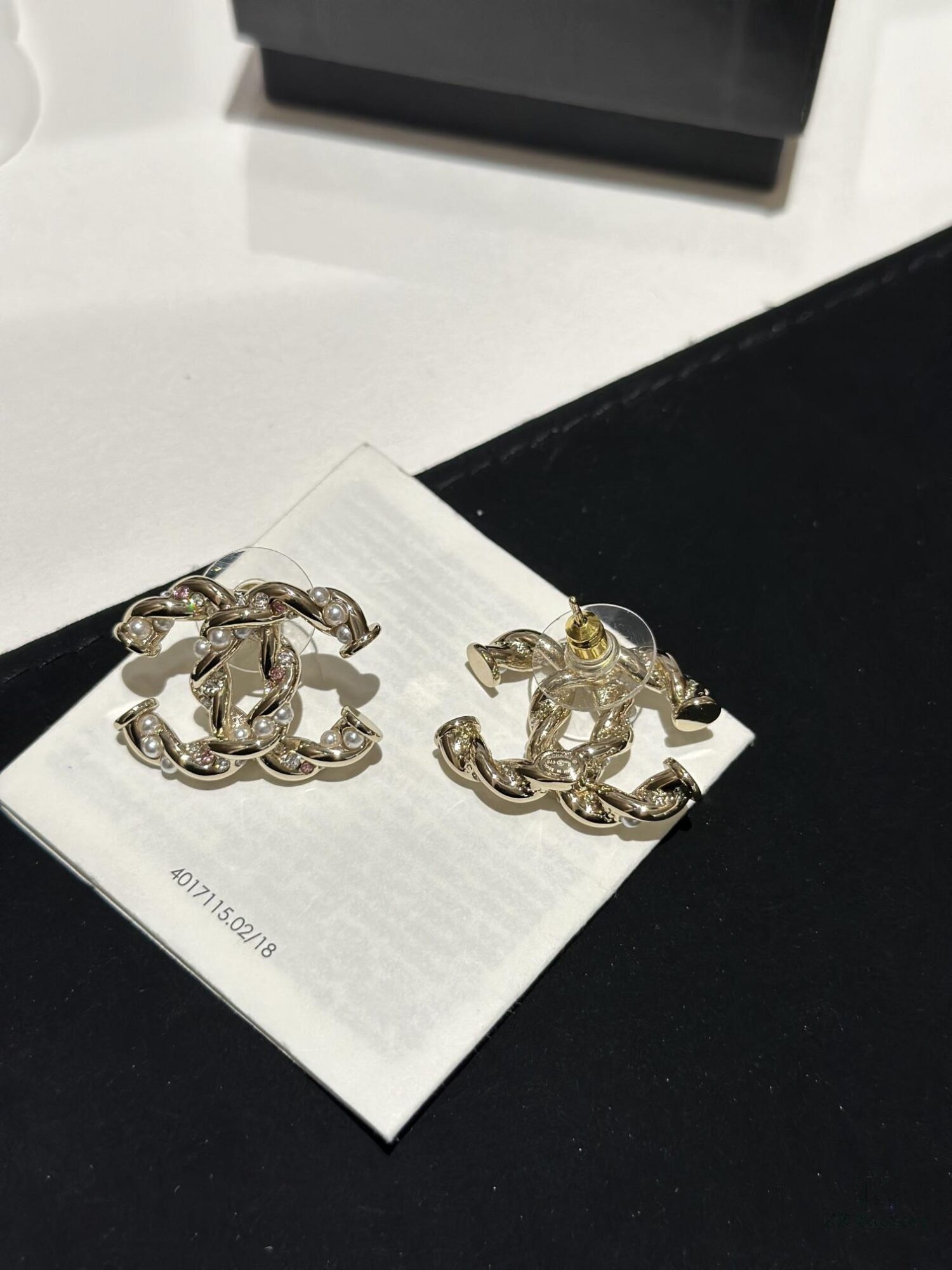 692ffccd99f2d84055c8e81b Xiao Xiang New Twist Braided Double C Pearl Pink Diamond Stud Earrings