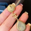 692ffce399f2d84055c8e838 Xiaoxiang New Sunflower Earrings, Luxury Full Diamond Pearl Drop Design, Elegant and Stylish for Daily Wear