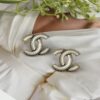 692ffd1e99f2d84055c8e88a Xiaoxiang New Arrival Vintage Beige Gold Double C Minimalist Resin White Stud Earrings